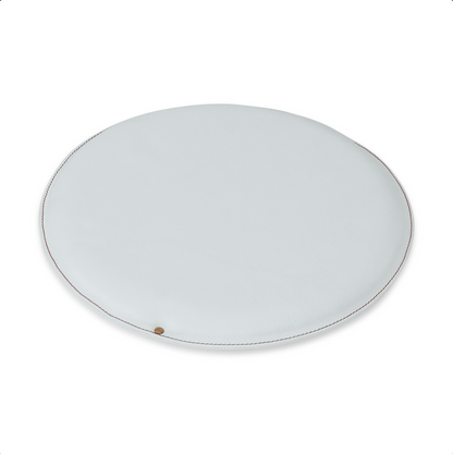 Round leather seat cushion in Big Blue with Burning Rust stitching