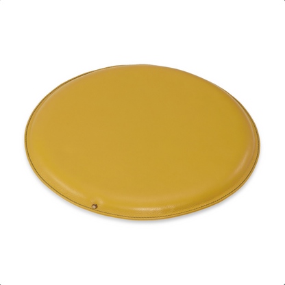 Round leather seat cushion in Mellow Yellow with Green Pine stitching