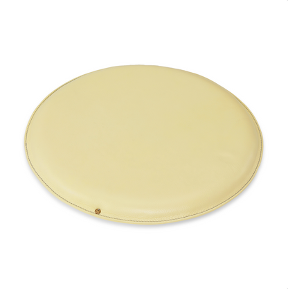 Round leather seat (seat cushion) in Pale Pineapple with Misty Green stitching for chairs